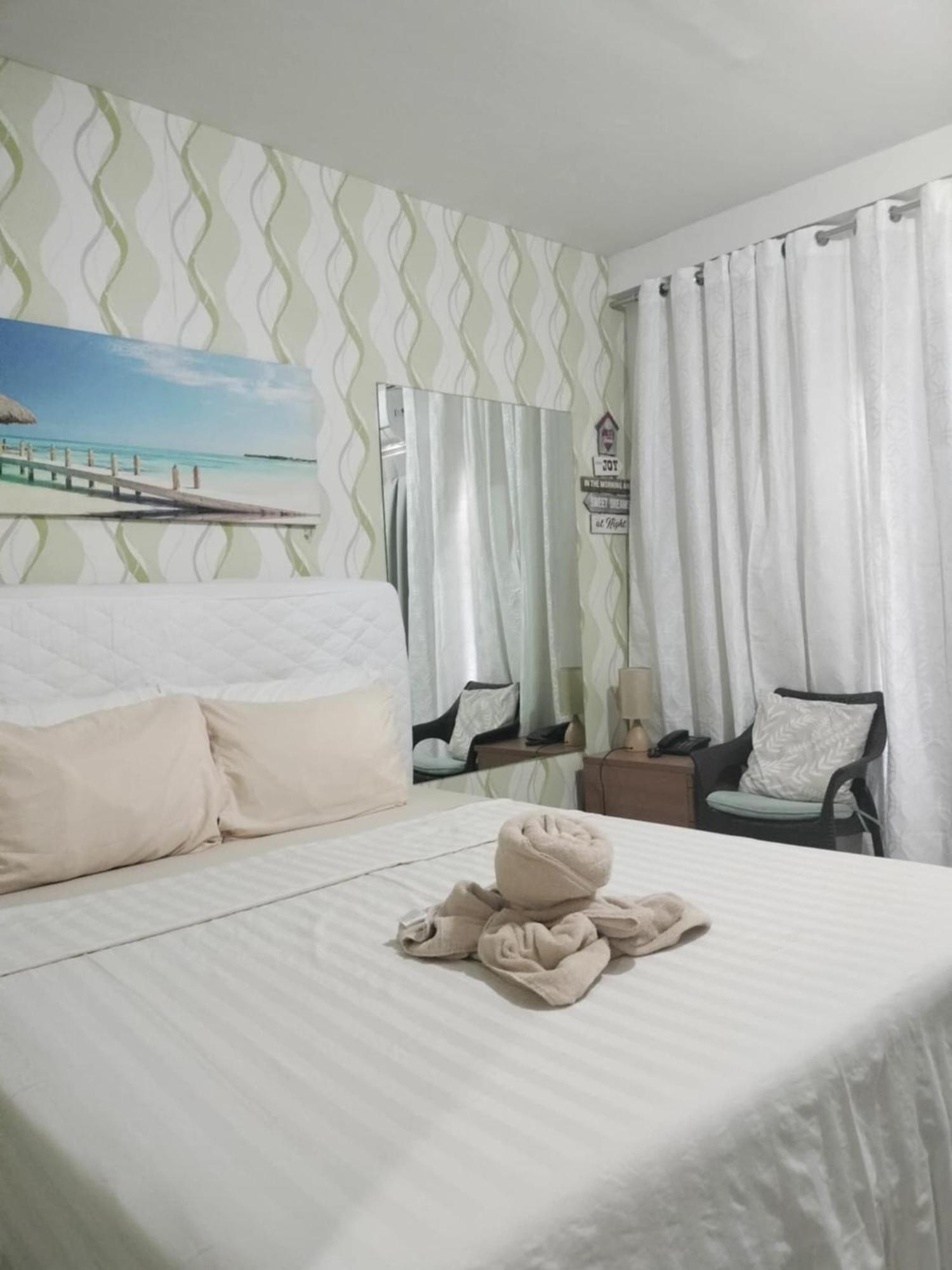 Stay And Fly At Amani Grand Resort Residences Île de Mactan Extérieur photo